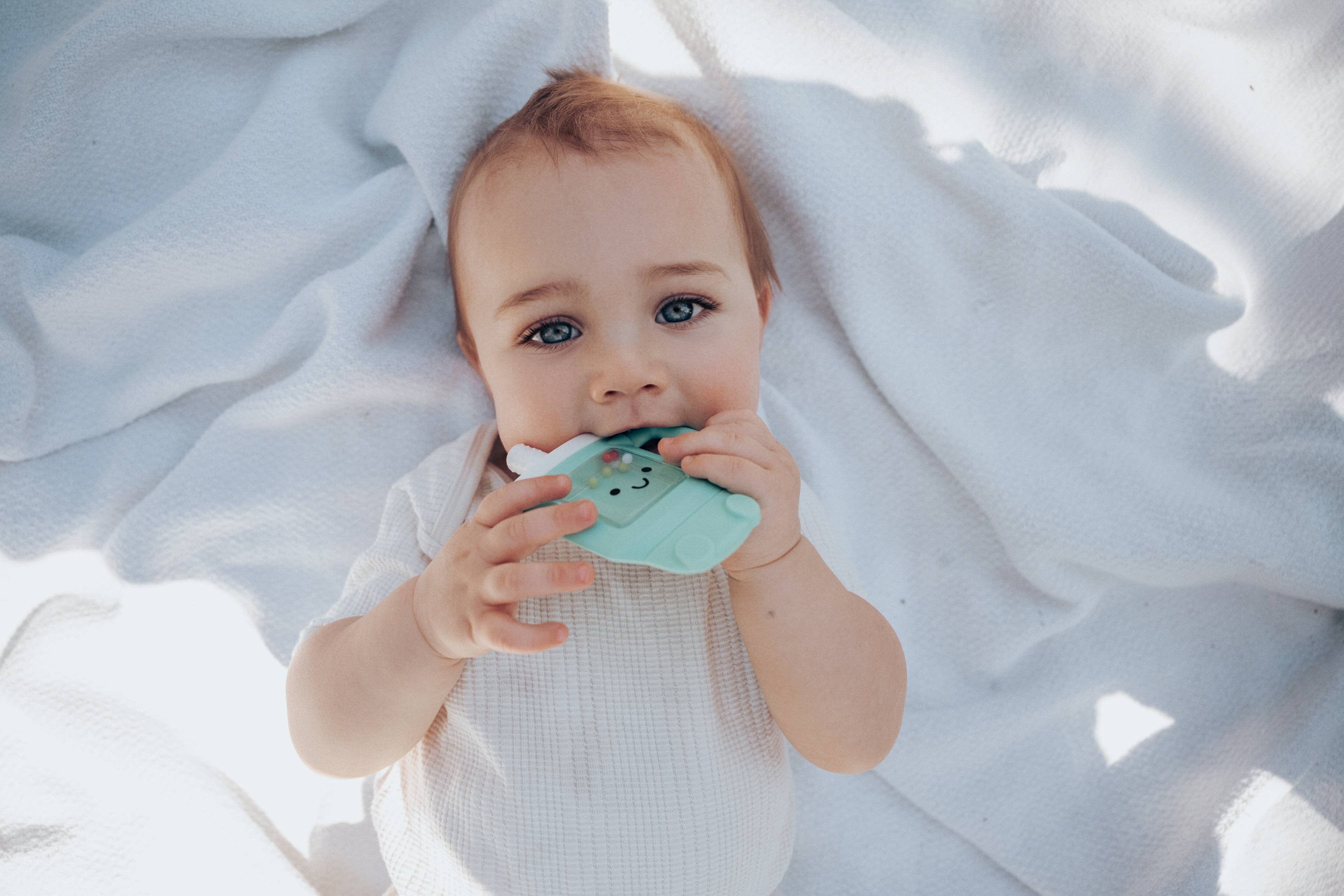 Sweetie Shake Plus™ - Teething + Rattle Toy: Croissant