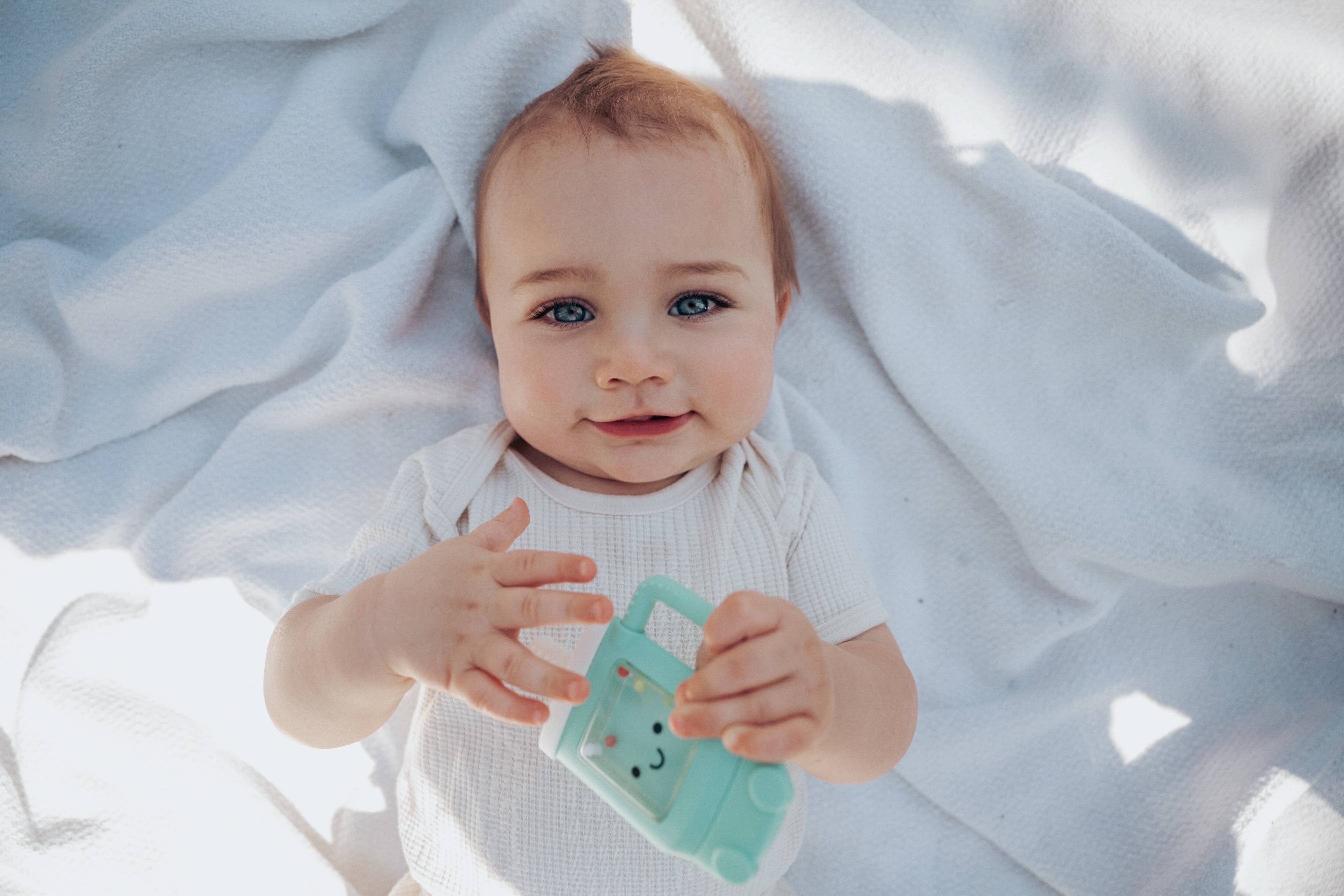 Sweetie Shake Plus™ - Teething + Rattle Toy: Croissant